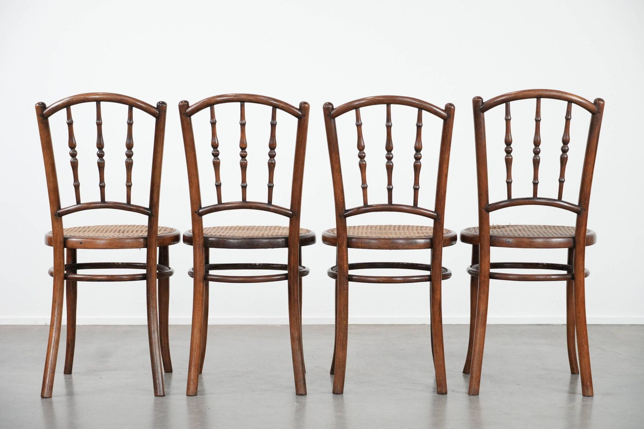 Set of 4 vintage bistro chairs Jacob & Josef Kohn Wien with a wicker seat