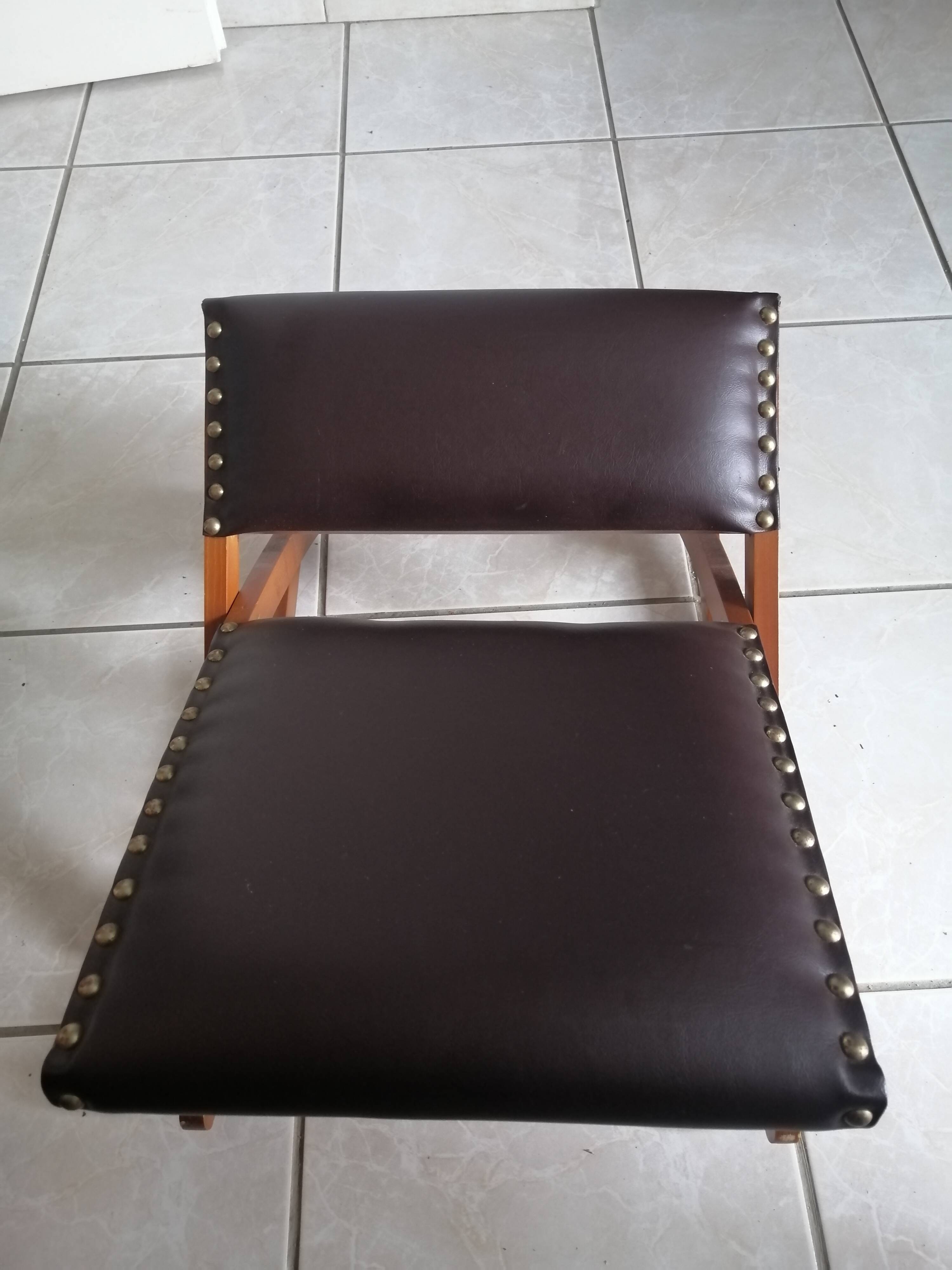 Vintage rocking footrests in wood and faux leather