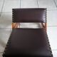 Vintage rocking footrests in wood and faux leather