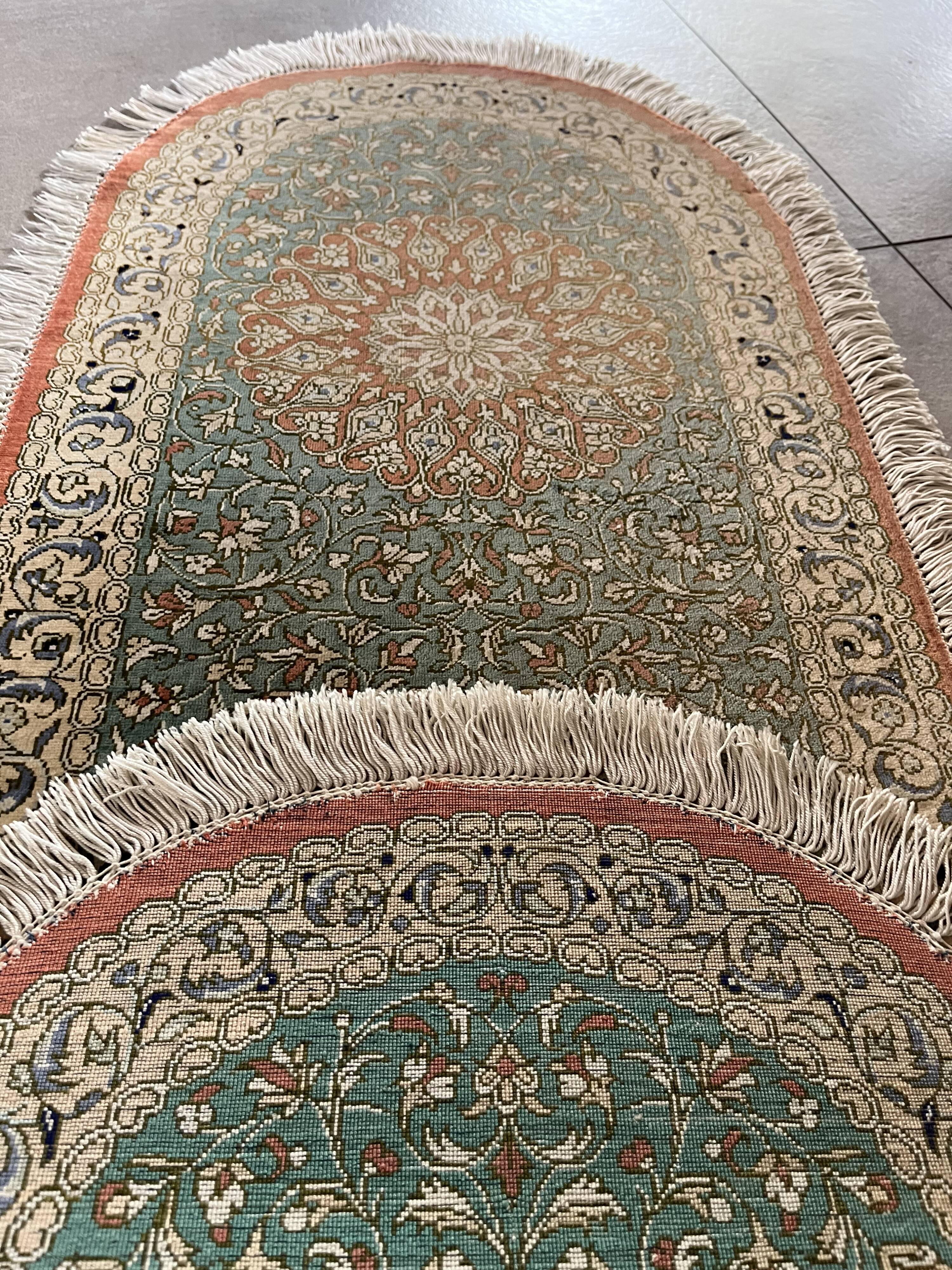 Sino Hereke oval silk rug