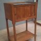 Curtained bedside table from the nineteenth century.