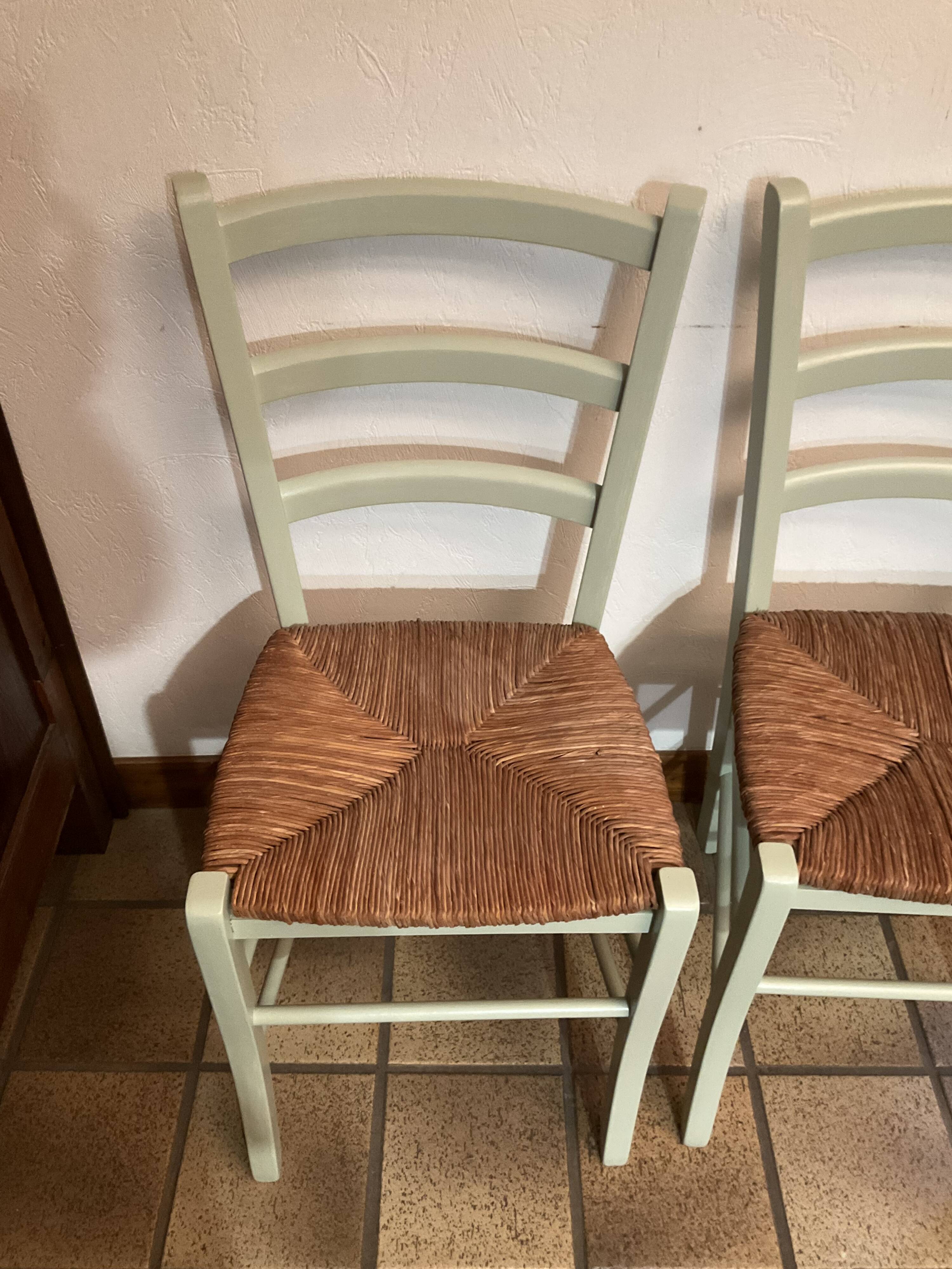 Pair of green straw chairs