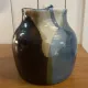 Beige and blue stoneware jug