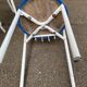 Vintage bistro garden chair in white tubular steel and blue leather from the 1980s.