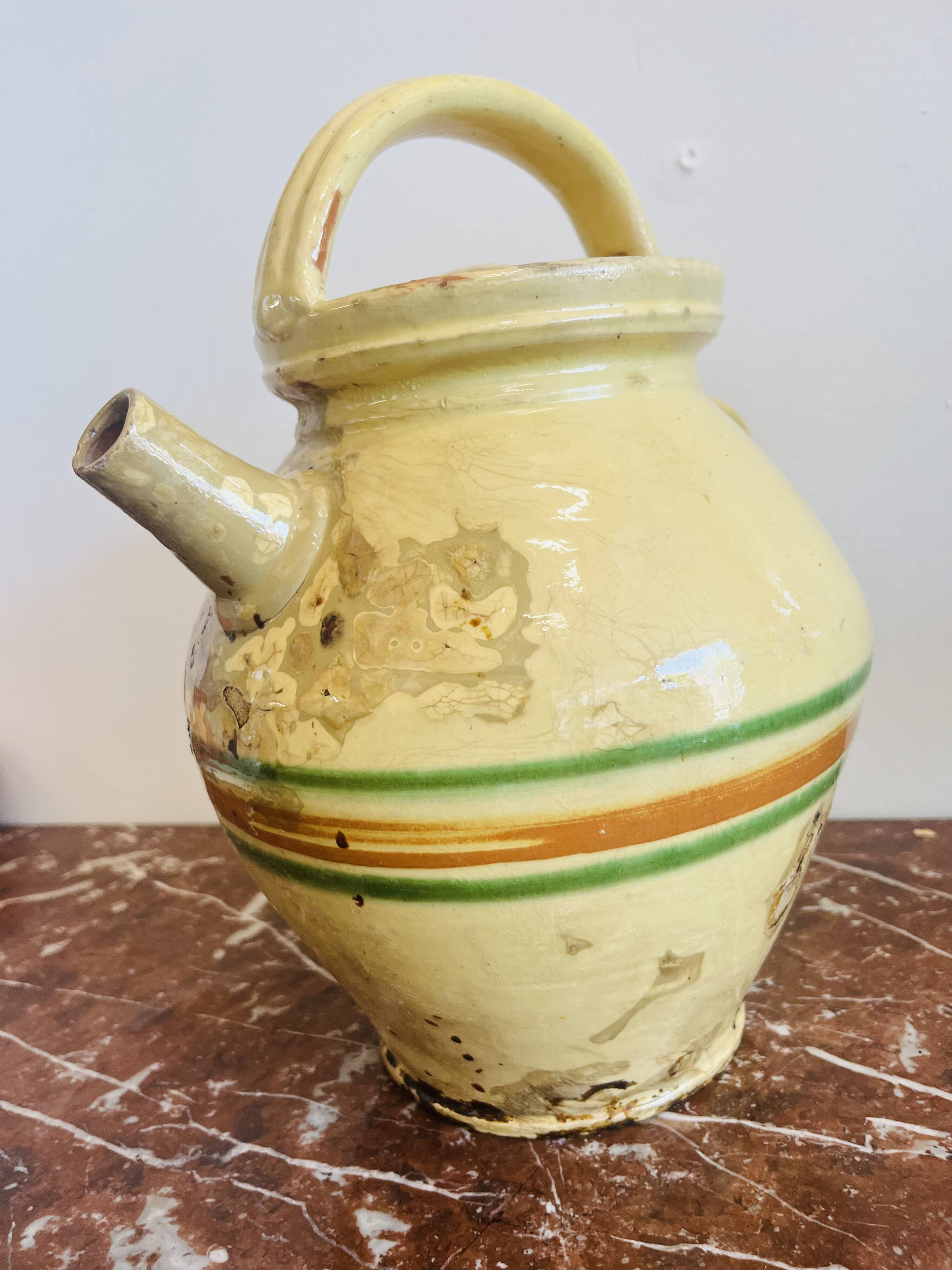 Old Savoyard pottery, decorated with orange and green edging