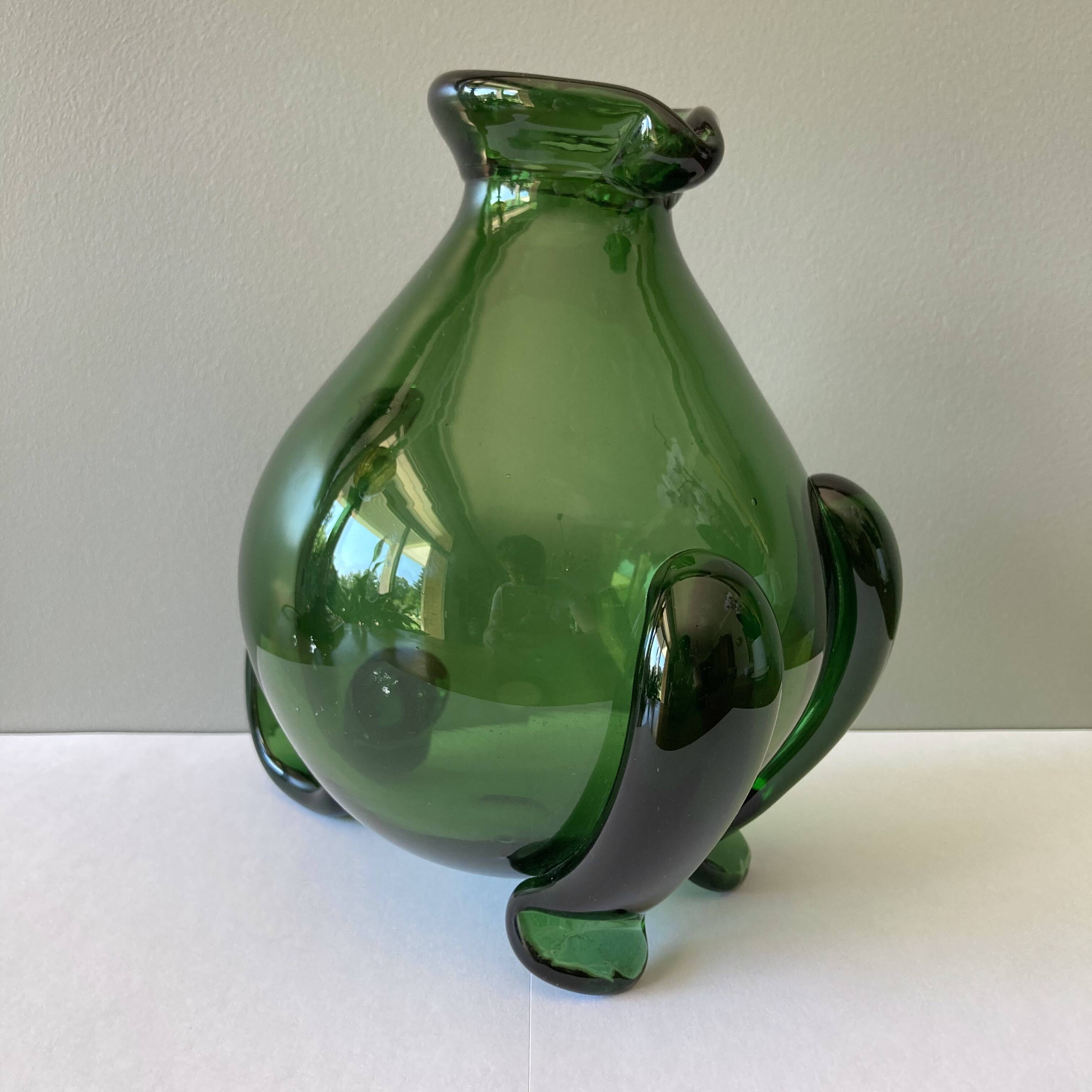 Amazing pitcher; vintage tripod jug or carafe in blown and hot-worked green glass