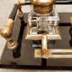 Hence the art deco inkwell on jet plate brass finishes