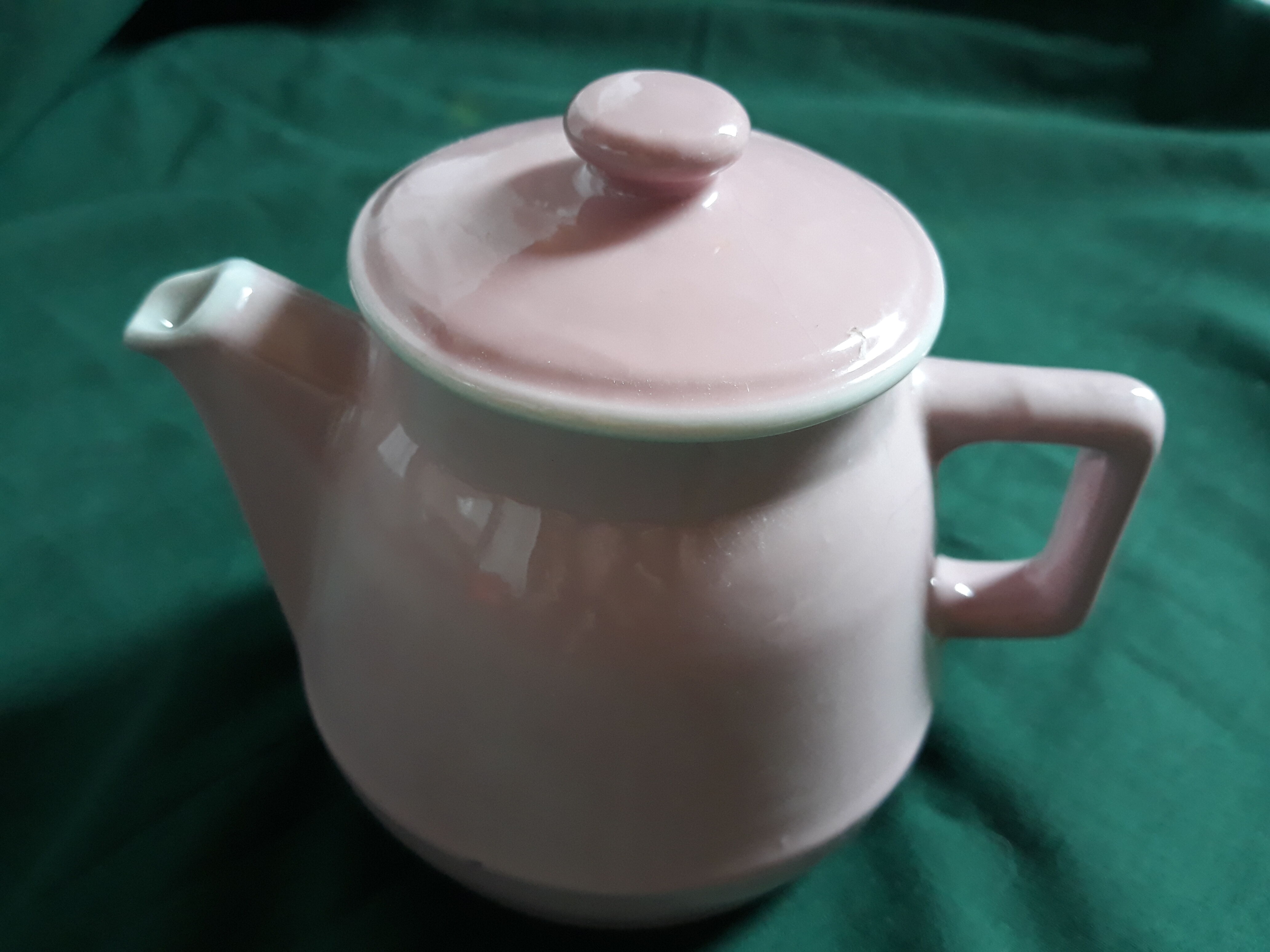 Old small pink teapot