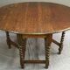 Table pliante en chêne des années 1900