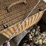 Antique wicker basket with closure and handle