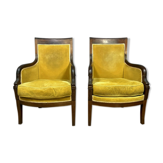 Pair of chairs Empire era to mahogany dolphins around 1810