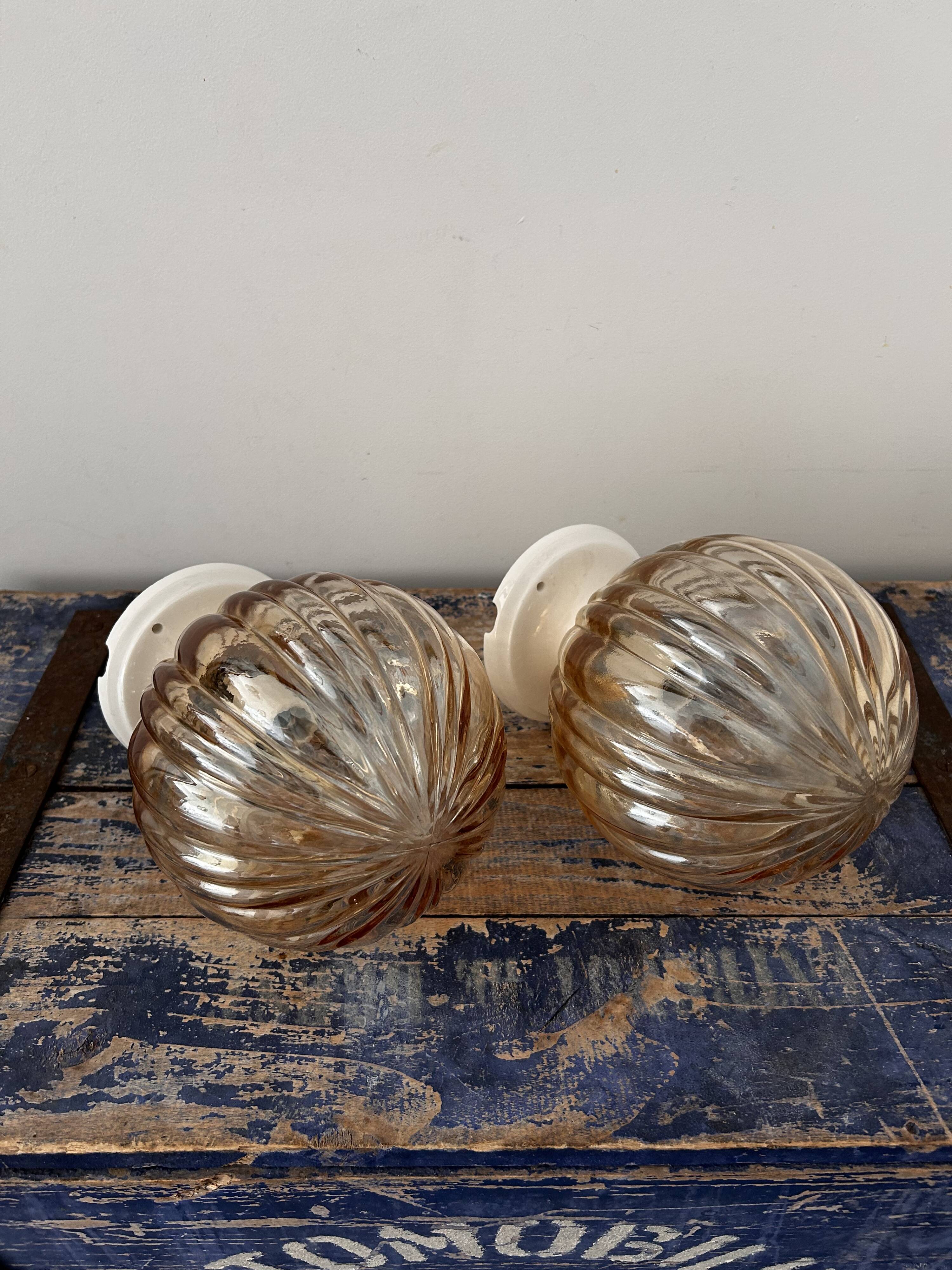 Pair of vintage golden globe wall or ceiling lights
