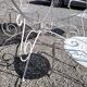 Old wrought iron garden furniture, table + 2 armchairs + 2 chairs