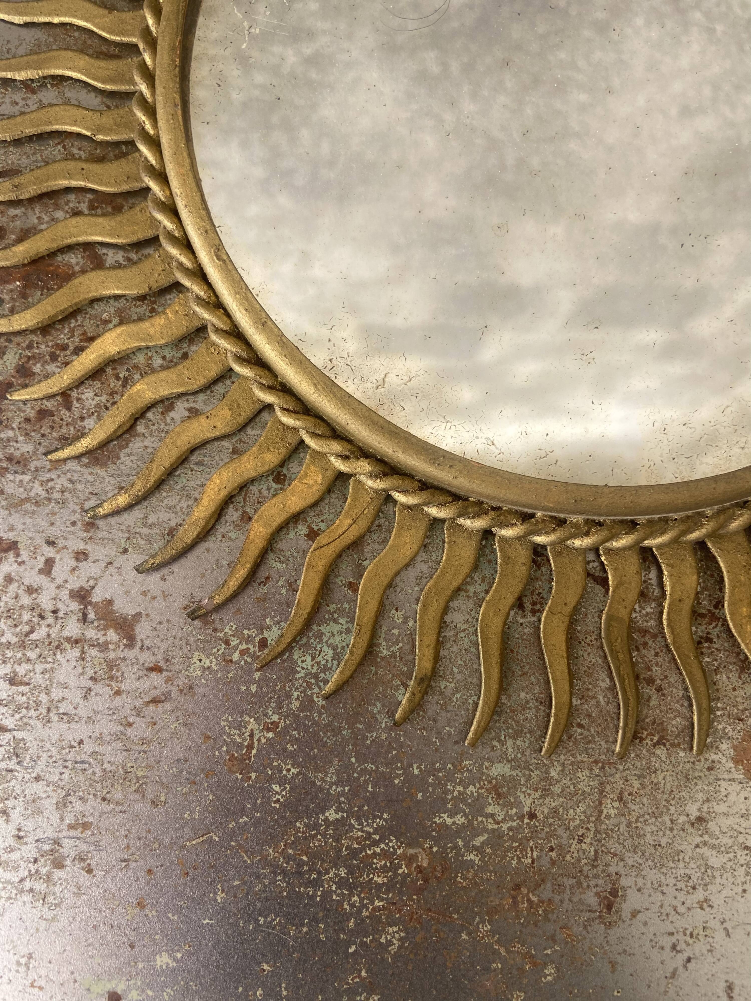Vintage gold metal sun mirror