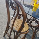 Rattan dining table and its 4 matching chairs