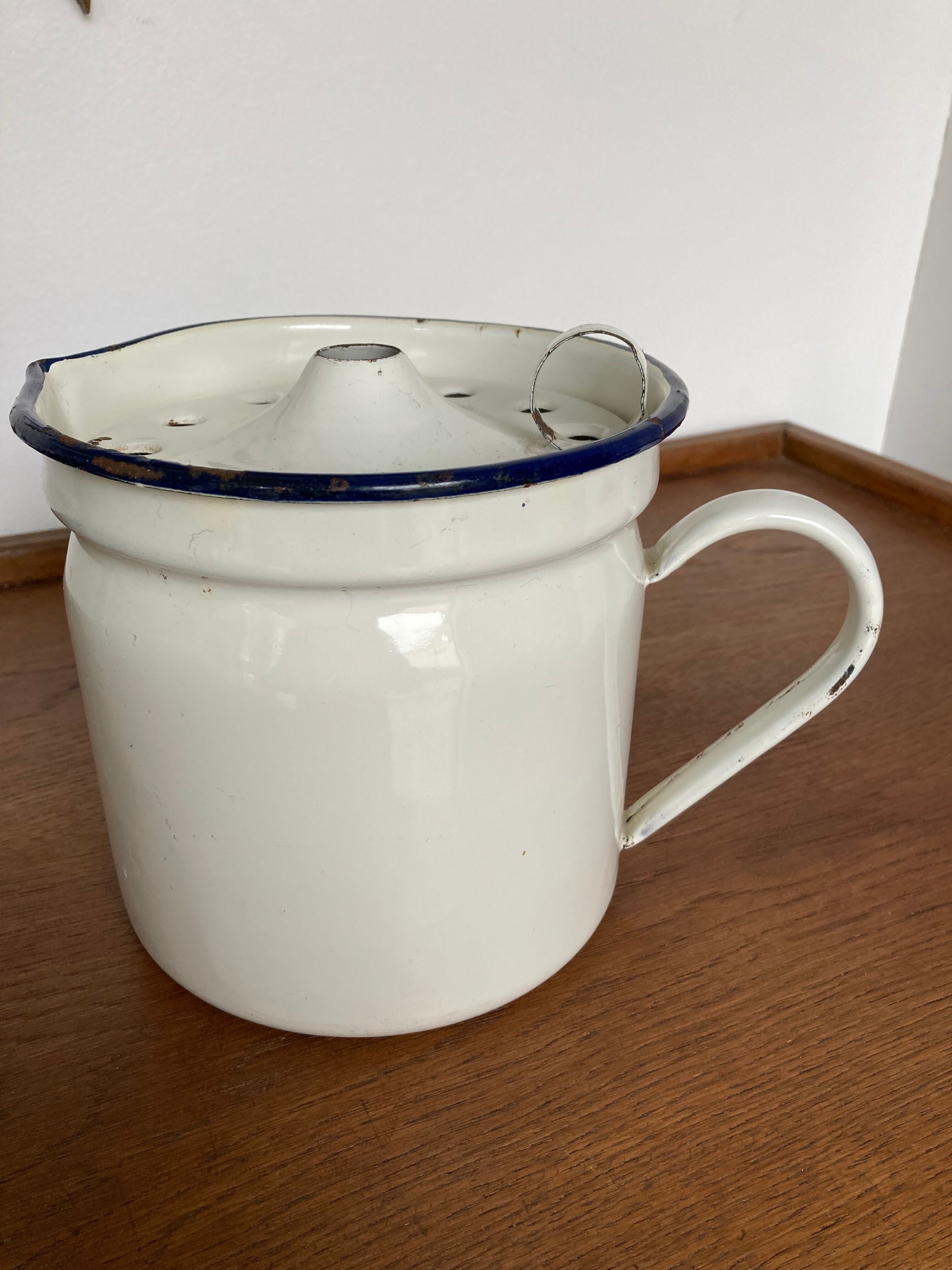 Vintage enamelled iron pitcher
