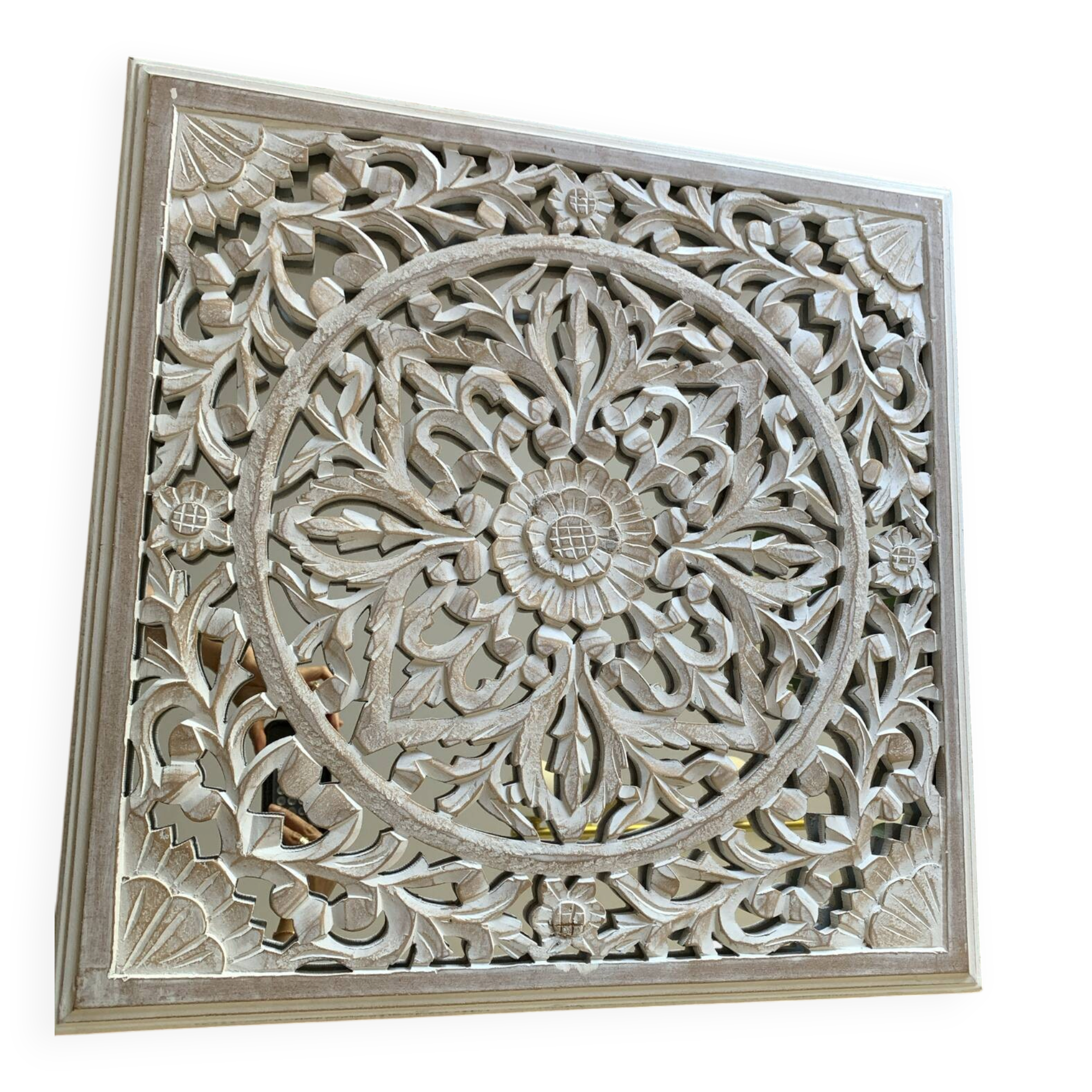 Magnificent carved frame with an interior mirror made of mango wood.