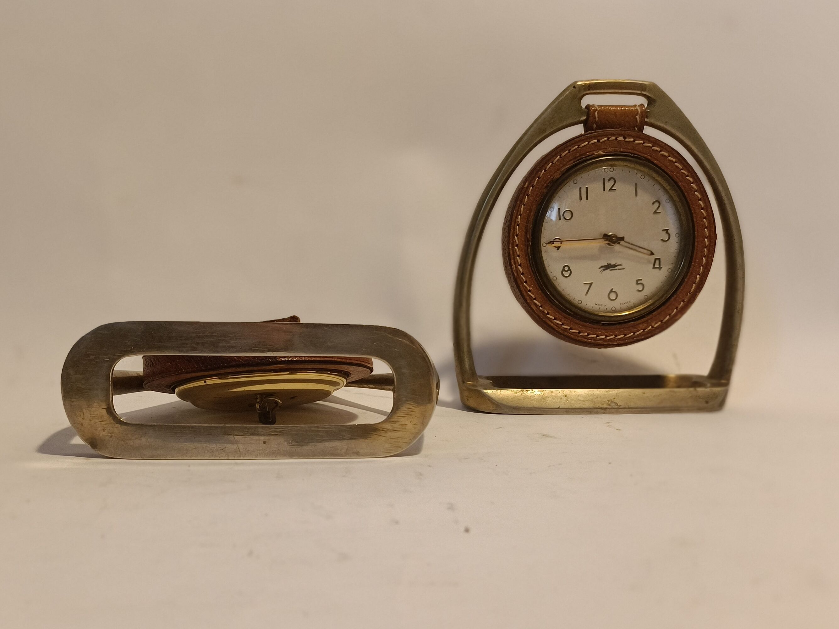 Pair of Longchamps 1960 leather stirrup pendulettes.
