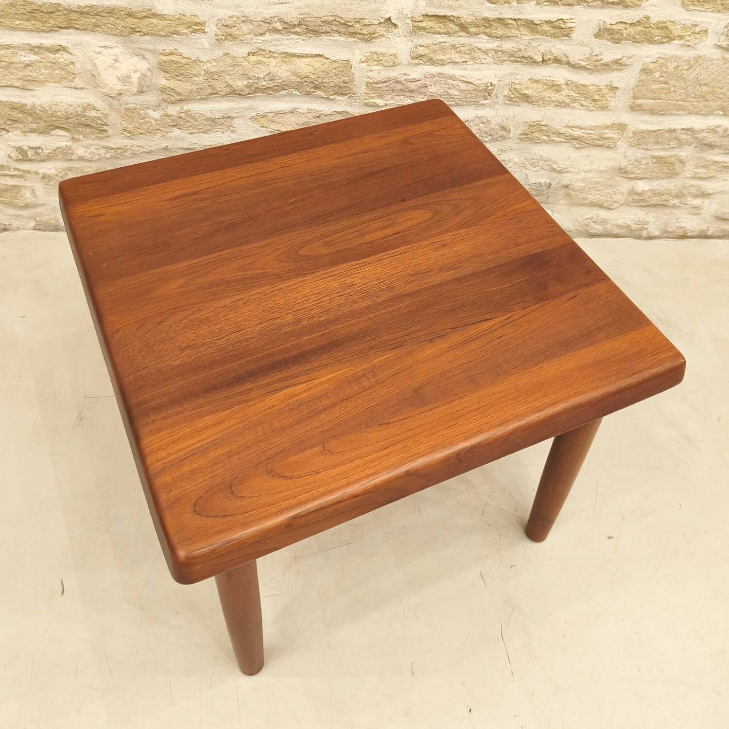 Teak coffee table designed by Niels Bach, Danish production.