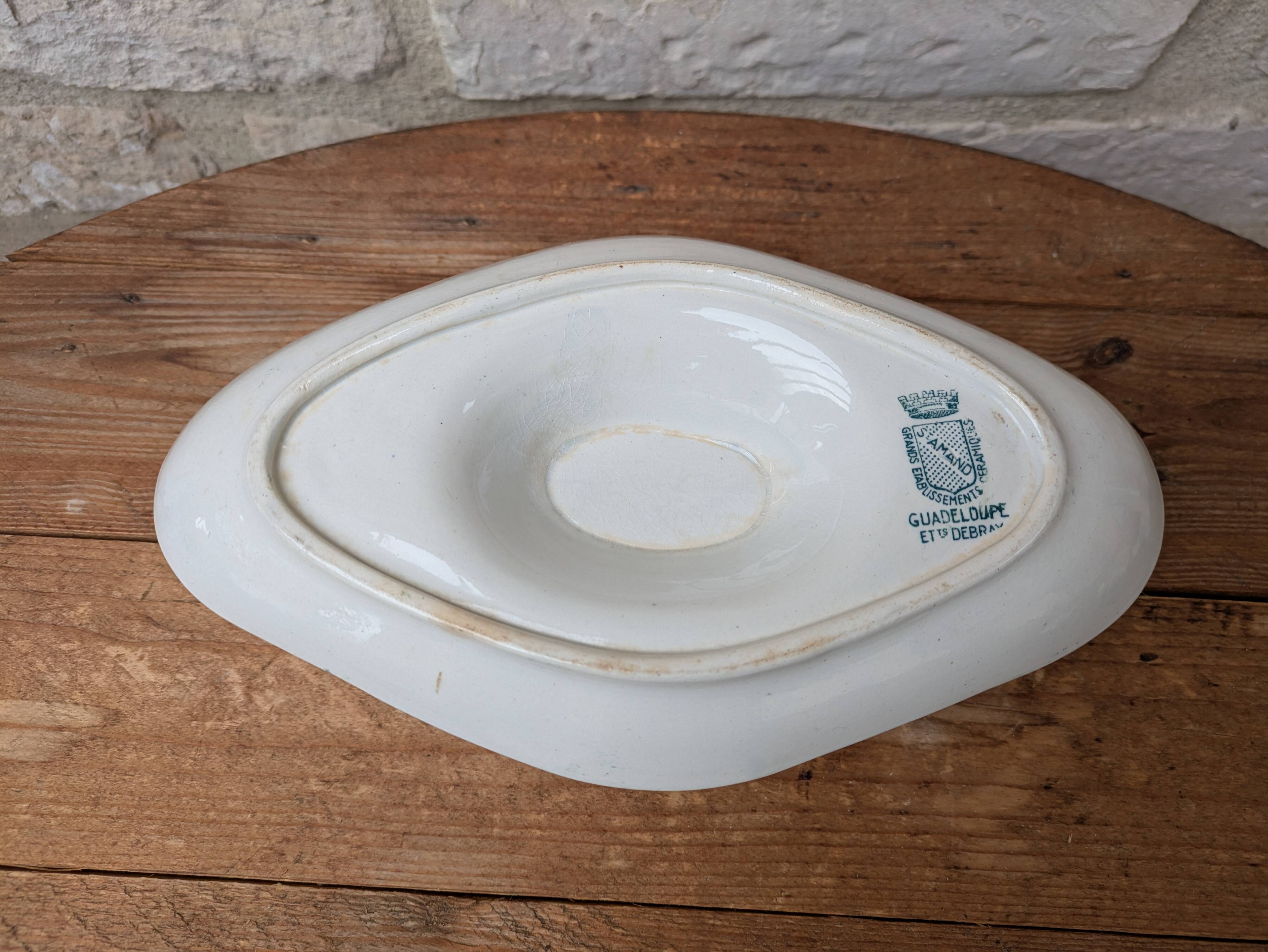 Old sauce boat on fixed frame Guadeloupe Saint Amand ceramic model