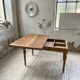 Walnut farmhouse table with swivel and extendable top