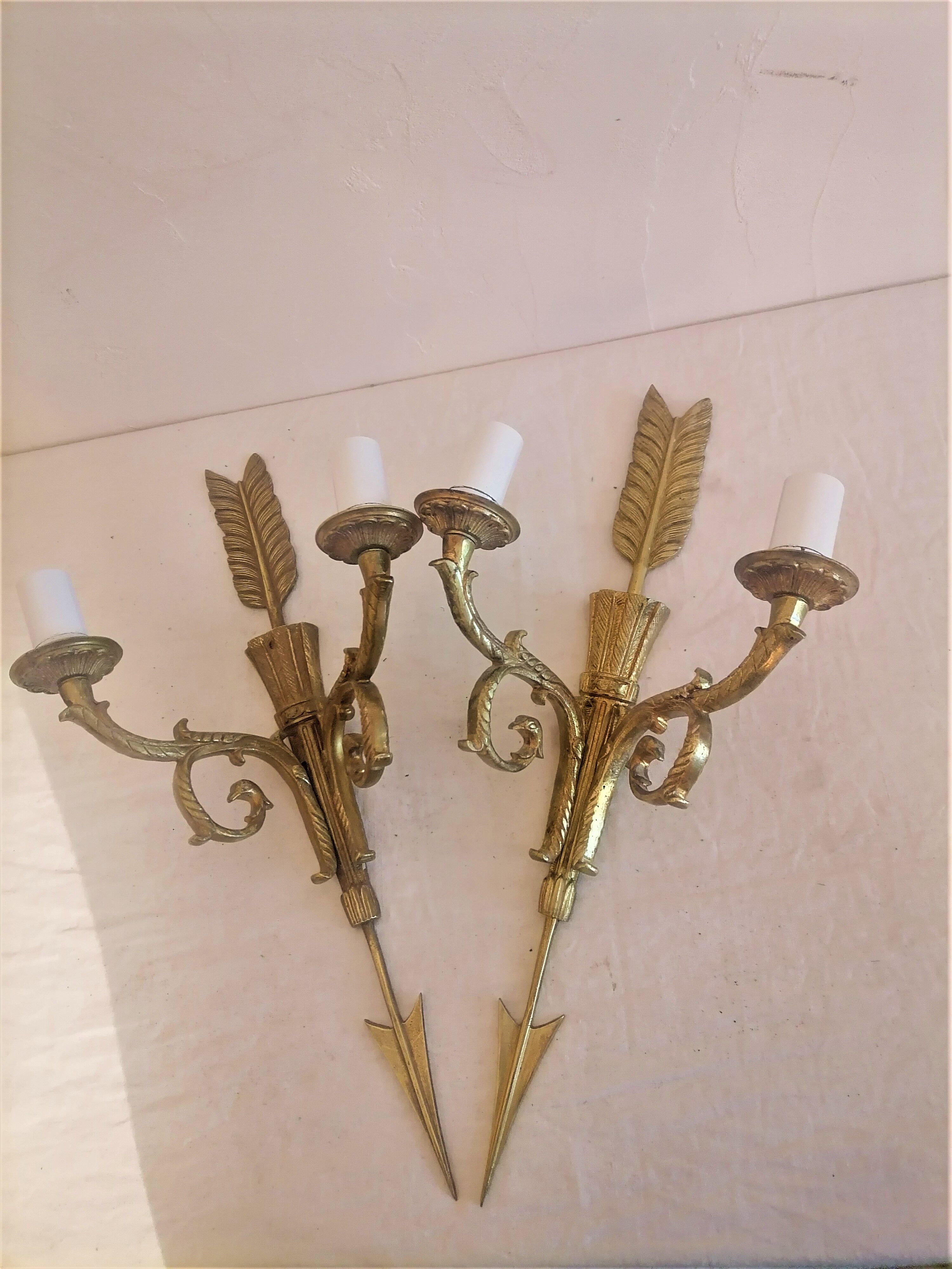 Ancienne paire d'appliques en bronze doré de style empire