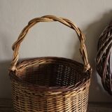 Small round wicker basket with one handle