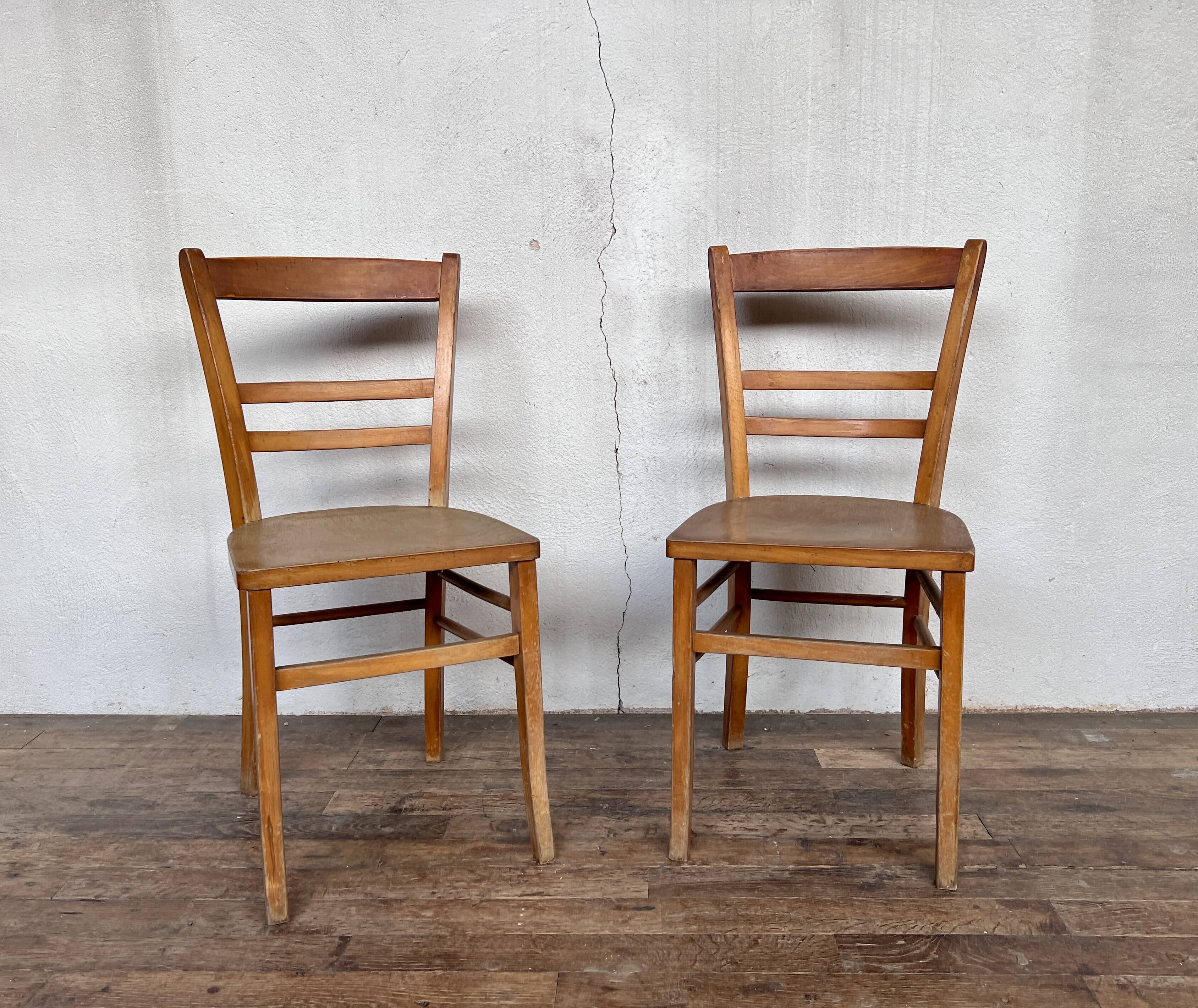 Pair of parisian wooden bistro chairs
