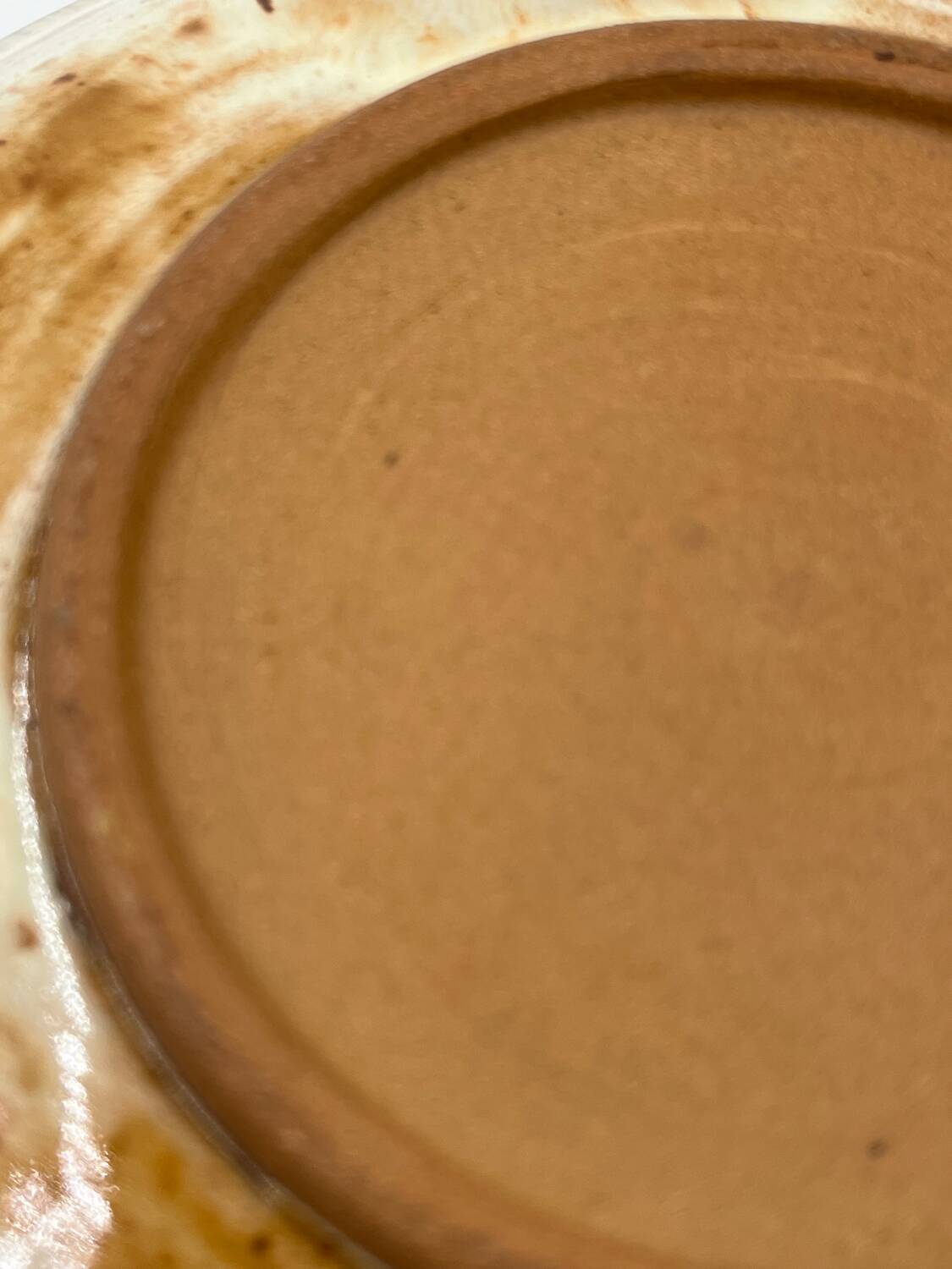 Red earthenware dessert plate