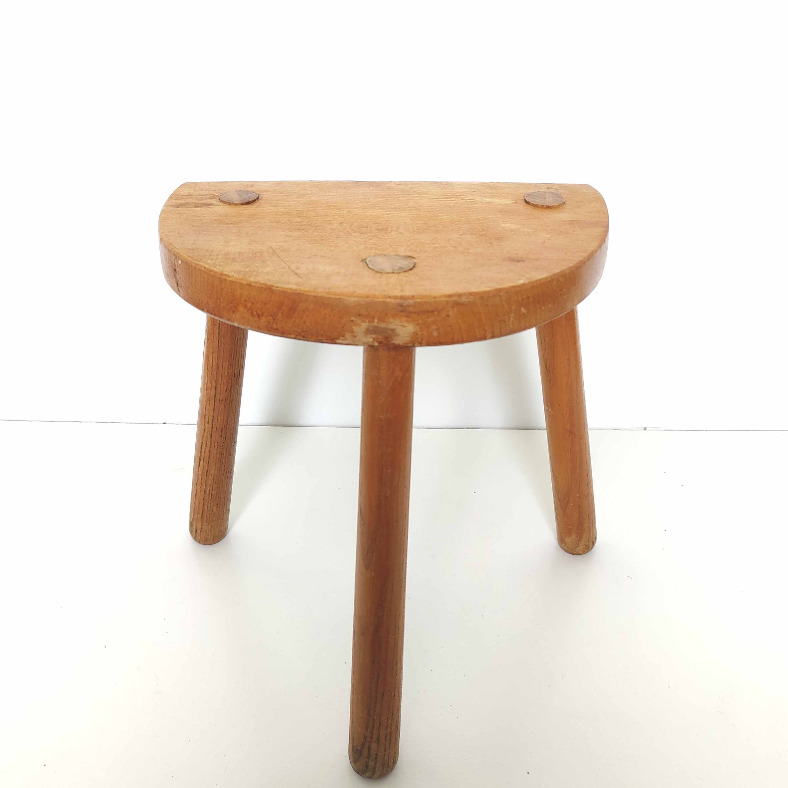Wooden tripod stool