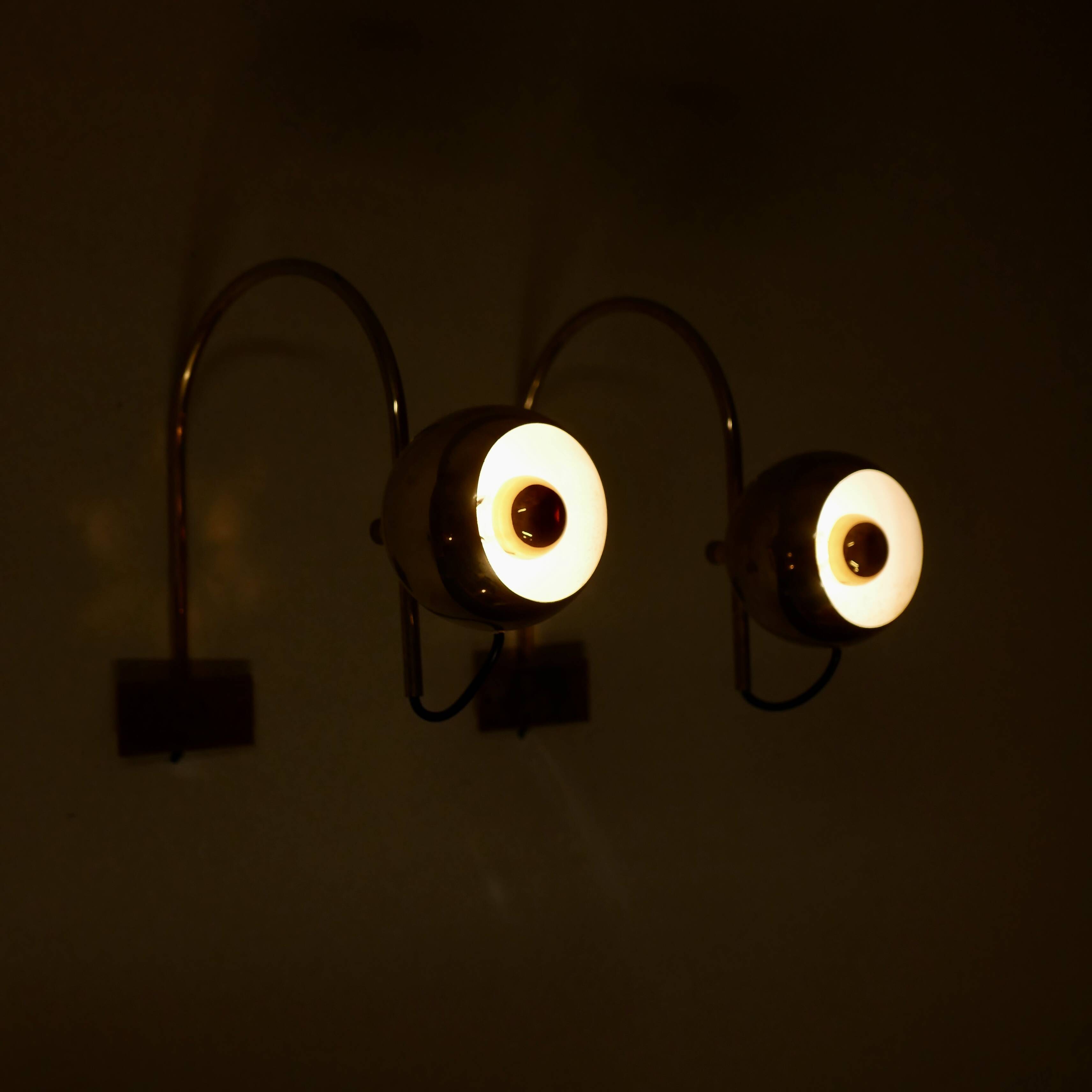 Pair of brass eyeball wall lights
