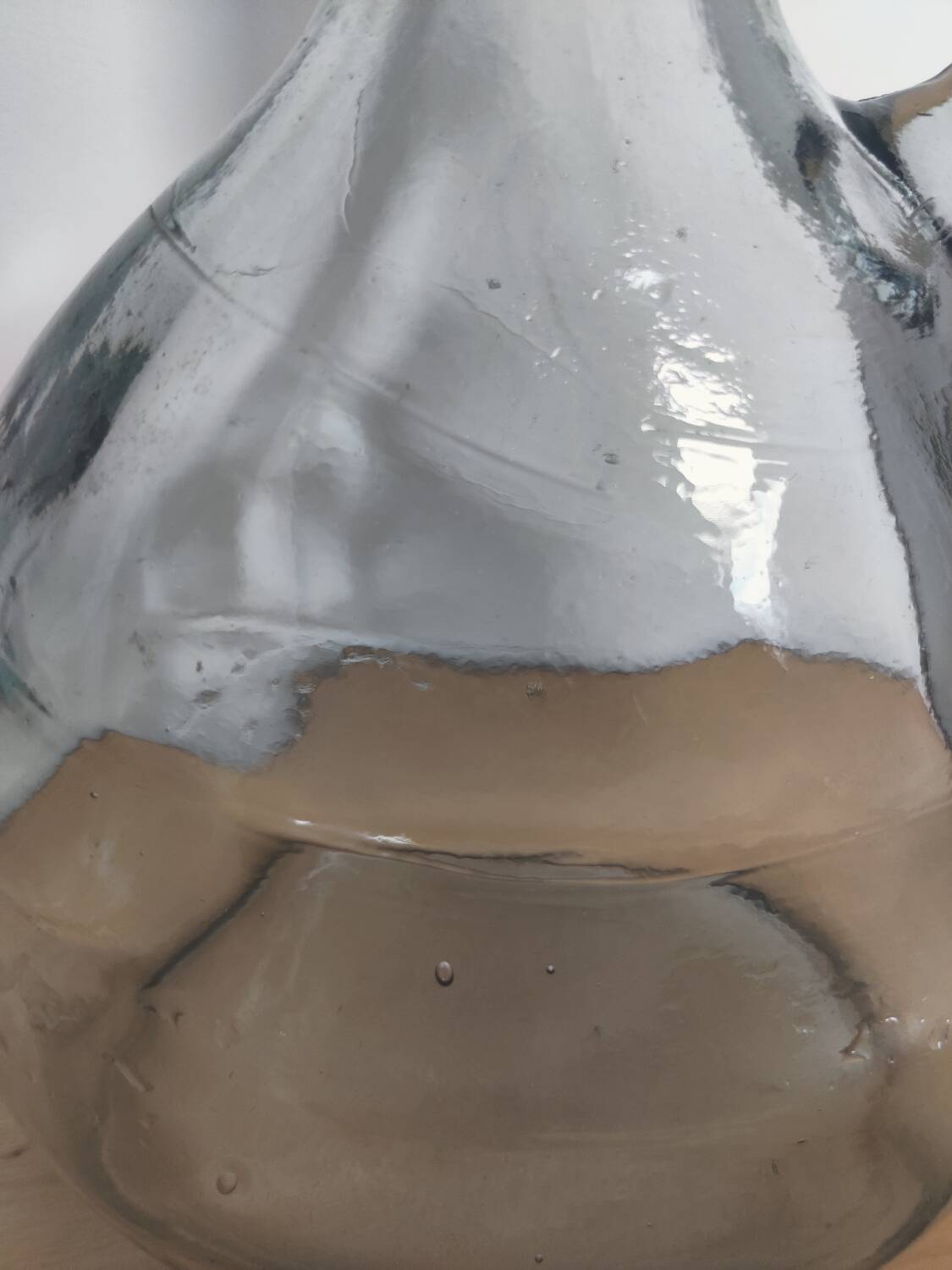 Antique carafe made of thick glass