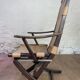 Colonial style leather armchair and ottoman