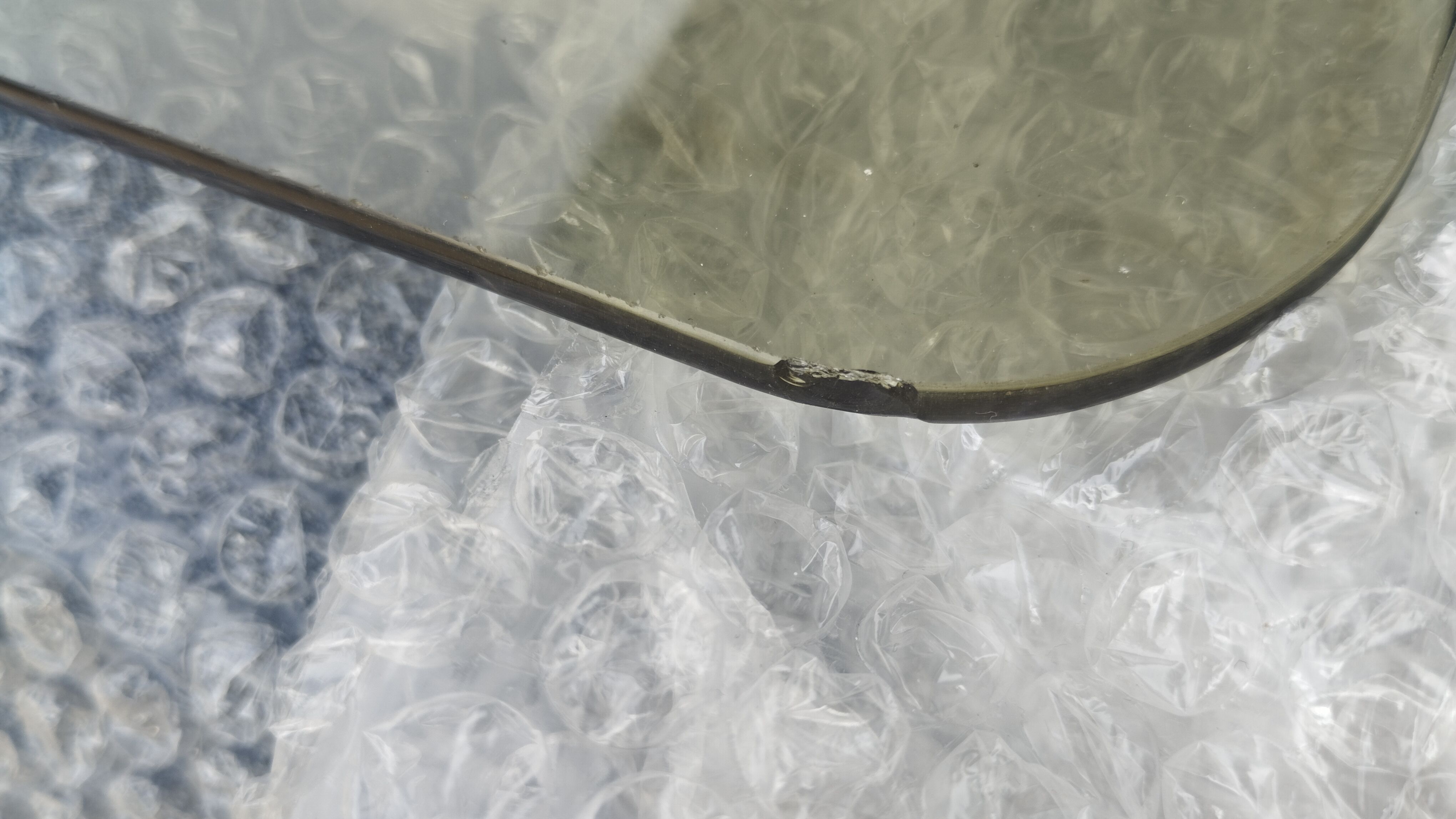 Nesting tables in chrome and smoked glass from the 70s