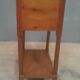 Curtained bedside table from the nineteenth century.