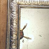 Old mercury mirror, in carved wood with silver leaf