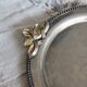 Vintage round silver metal serving tray with gold knot handles