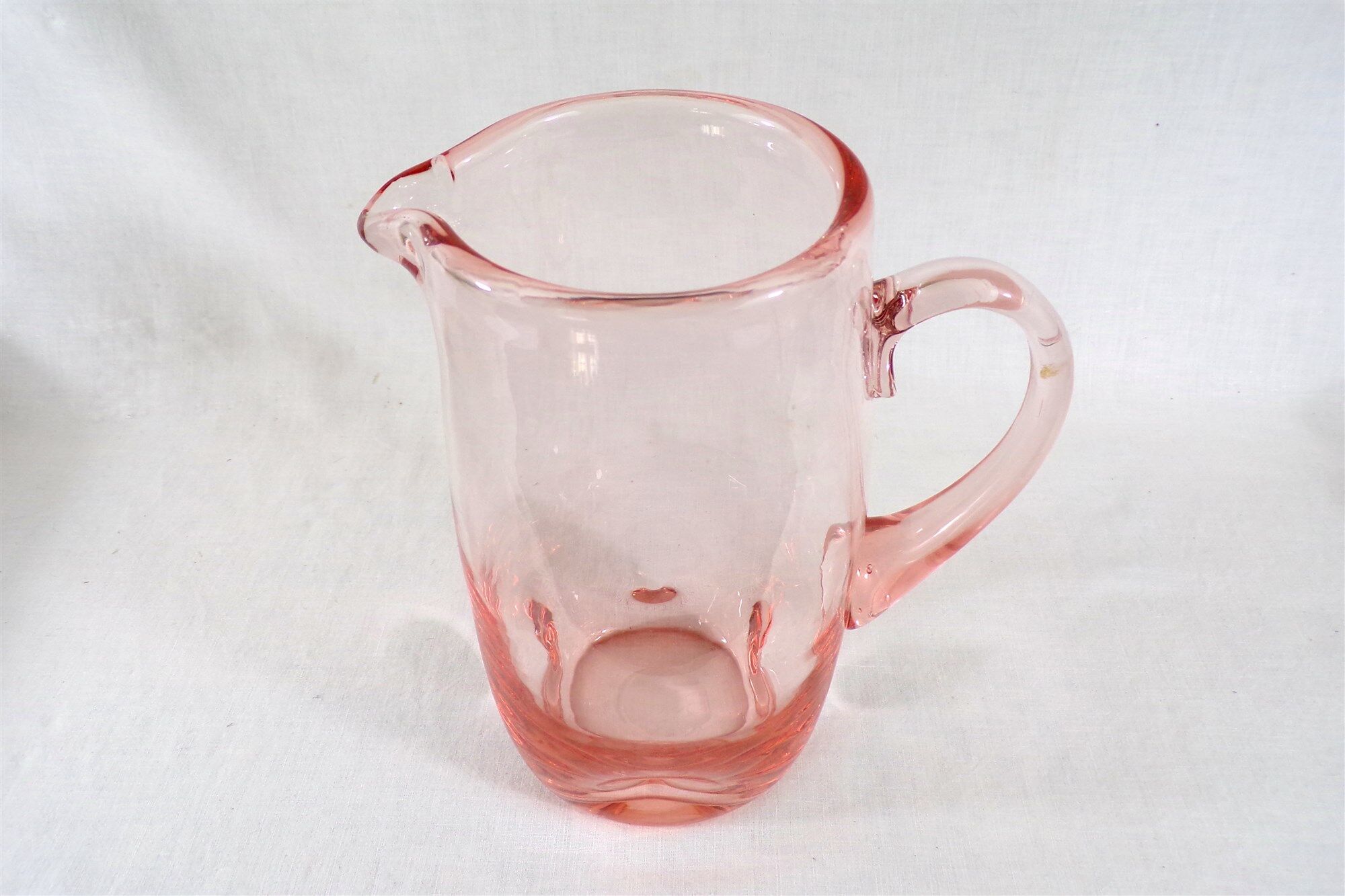 Antique pitcher made of blown glass