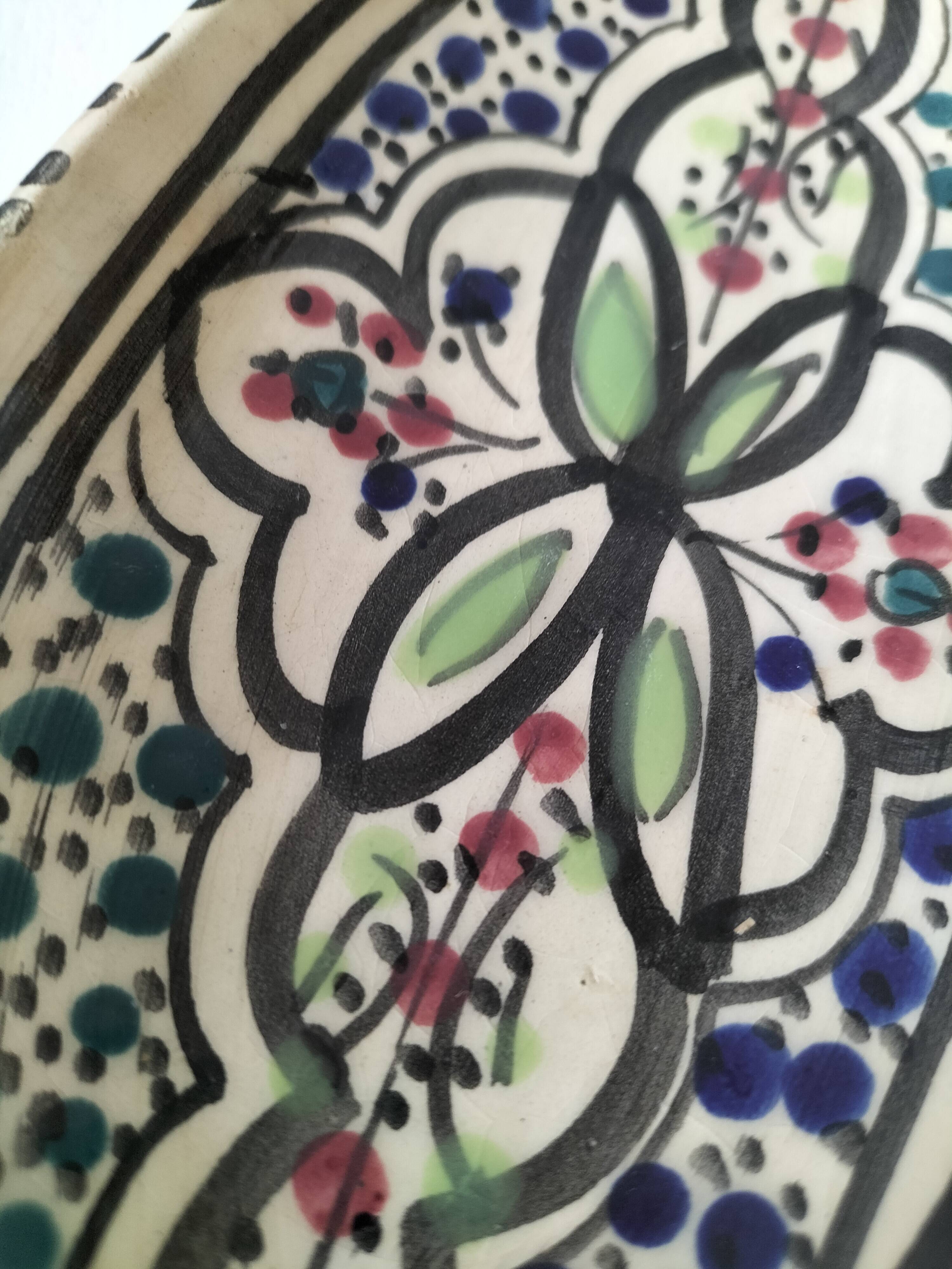 Moroccan glazed ceramic dish in Safi craft style
