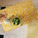 Antique rattan coffee table - yellow floral top