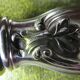 Silver salad servers stuffed in its case