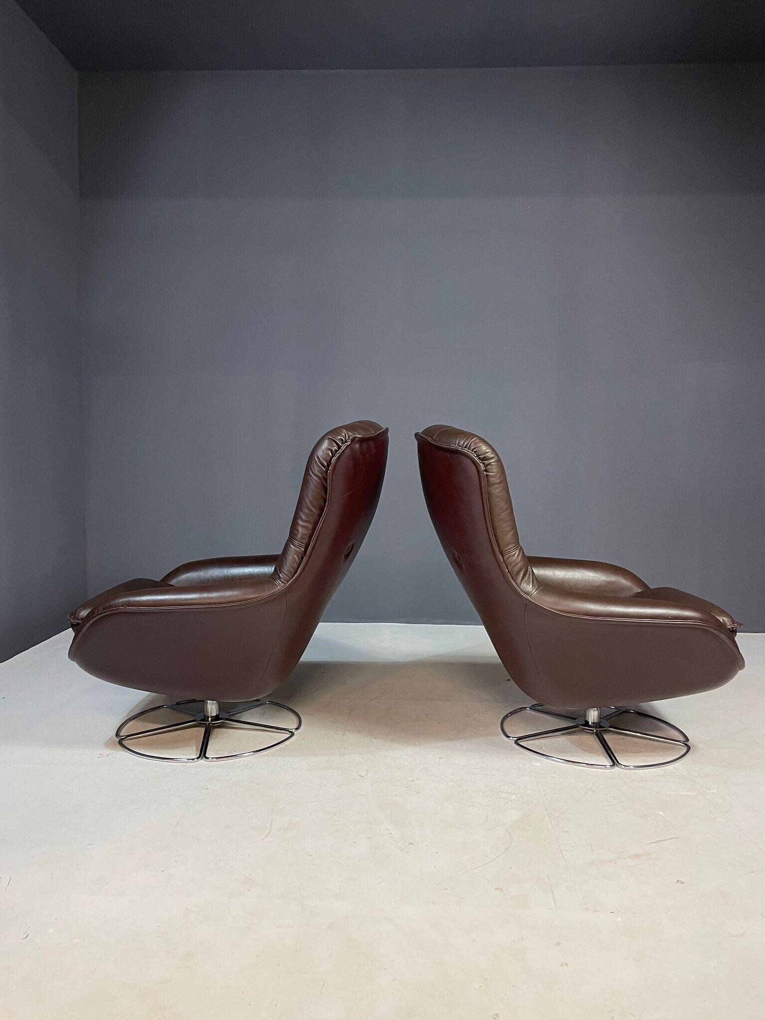 Pair of leather swivel armchairs by PEEM, Finland, 1970s