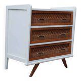 Scandinavian chest of drawers made of wood and rattan