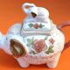 White porcelain teapot decorated with peonies elephant shape