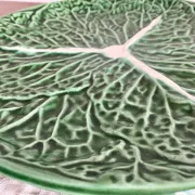 Large soup tureen in earthenware with a cabbage design, along with a dish and spoon.