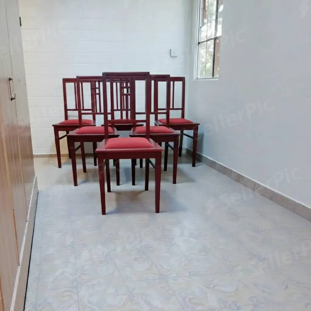 6 Art Deco dining chairs in solid wood and burgundy leather.