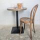 Pink and brass bistro table, Art Deco pyramidal base.
