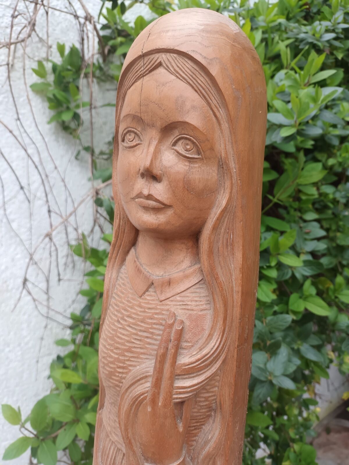 Young woman sculpture by Ray Boterf