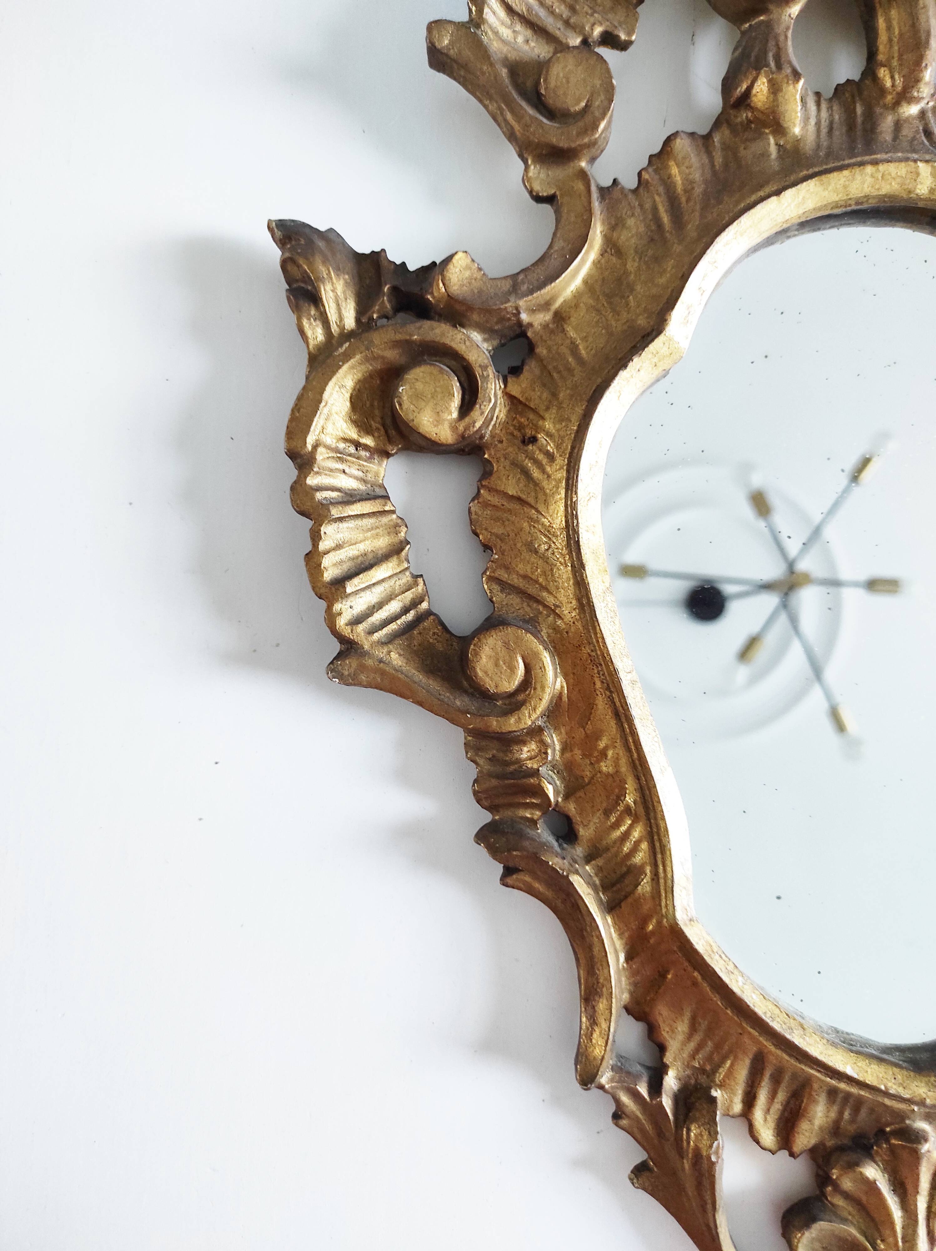 Gilded wood mirror, 56 x 32 cm