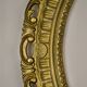 Oval frame in golden resin